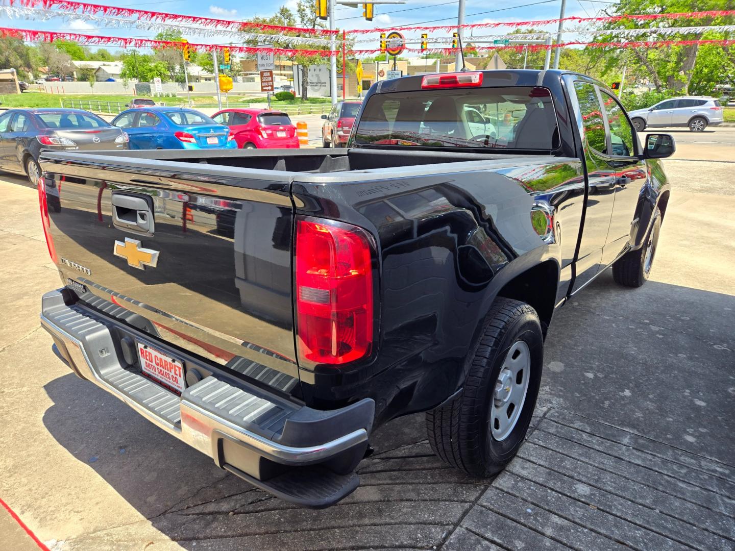 2017 BLACK Chevrolet Colorado Work Truck Ext. Cab 2WD (1GCHSBEA8H1) with an 2.5L L4 DOHC 16V GAS engine, 6A transmission, located at 503 West Court, Seguin, TX, 78155, (830) 379-3373, 29.568621, -97.969803 - Photo#2